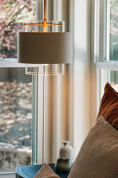 A pendant beside a sunlit window