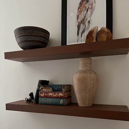 Ceramics and books on open shelving
